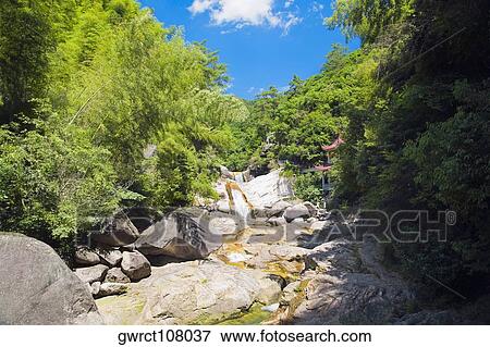 Waterfall in a forest, Emerald Valley, Huangshan, Anhui Province, China View Large Photo Image Stock Photo - Waterfall in a forest, Emerald Valley, Huangshan, Anhui Province, China. Fotosearch
