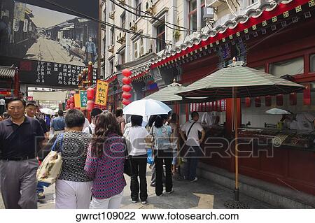 Group of people in a market, WangfuJing, Beijing, China View Large Photo Image Stock Image - Group of people in a market, WangfuJing, Beijing, China. Fotosearch