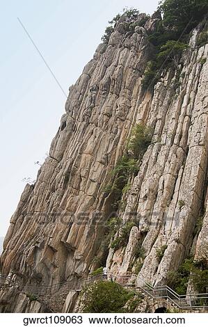 Low angle view of a cliff, Shaolin Monastery, Henan Province, China View Large Photo Image Stock Image - Low angle view of a cliff, Shaolin Monastery, Henan Province, China. Fotosearch