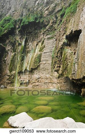 River flowing through rocks, Mt Yuntai, Jiaozuo, Henan Province, China View Large Photo Image Stock Image - River flowing through rocks, Mt Yuntai, Jiaozuo, Henan Province, China. Fotosearch