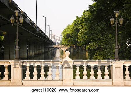 Bridge over a river, Shamian Island, Guangzhou, Guangdong Province, China View Large Photo Image Stock Image - Bridge over a river, Shamian Island, Guangzhou, Guangdong Province, China. Fotosearch