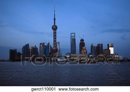 Buildings at the waterfront, Oriental Pearl Tower, Huangpu River, Lujiazui, The Bund, Shanghai, China View Large Photo Image Stock Image - Buildings at the waterfront, Oriental Pearl Tower, Huangpu River, Lujiazui, The Bund, Shanghai, China. Fotosearch
