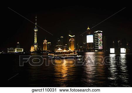 Buildings at the waterfront, Oriental Pearl Tower, Huangpu River, Lujiazui, The Bund, Shanghai, China View Large Photo Image Stock Image - Buildings at the waterfront, Oriental Pearl Tower, Huangpu River, Lujiazui, The Bund, Shanghai, China. Fotosearch