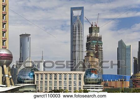 Buildings in a city, Lujiazui, The Bund, Shanghai, China View Large Photo Image Stock Image - Buildings in a city, Lujiazui, The Bund, Shanghai, China. Fotosearch