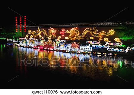 Buildings lit up at night, Nanjing, Jiangsu Province, China View Large Photo Image Stock Photograph - Buildings lit up at night, Nanjing, Jiangsu Province, China. Fotosearch