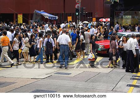 Stock Photography - Crowd walking in a street, Hong Kong Island, Hong Kong, China. Fotosearch