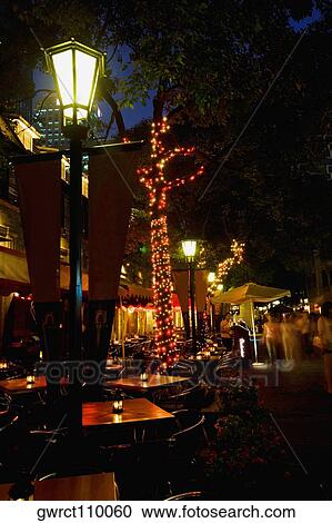 Empty chairs and tables at a sidewalk cafe, Xintiandi, Shanghai, China View Large Photo Image Stock Image - Empty chairs and tables at a sidewalk cafe, Xintiandi, Shanghai, China. Fotosearch