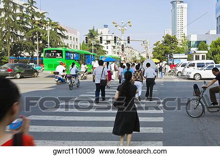 Group of people on the road, Hefei, Anhui Province, China View Large Photo Image Stock Photo - Group of people on the road, Hefei, Anhui Province, China. Fotosearch