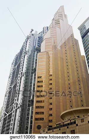 Low angle view of a skyscraper, Standard Chartered Bank Building, Hong Kong Island, Hong Kong, China View Large Photo Image Stock Photography - Low angle view of a skyscraper, Standard Chartered Bank Building, Hong Kong Island, Hong Kong, China. Fotosearch