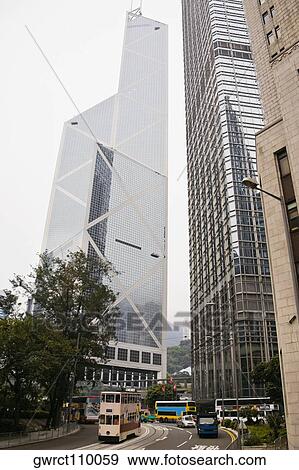 Skyscraper in a city, Bank of China and Cheung Kong Towers, Hong Kong Island, Hong Kong, China View Large Photo Image Stock Photo - Skyscraper in a city, Bank of China and Cheung Kong Towers, Hong Kong Island, Hong Kong, China. Fotosearch
