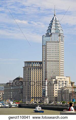 Skyscraper in a city, The Bund, Huangpu River, Shanghai, China View Large Photo Image Stock Image - Skyscraper in a city, The Bund, Huangpu River, Shanghai, China. Fotosearch