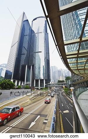Traffic on the road, Des Voeux Road, Hong Kong Island, China View Large Photo Image Stock Image - Traffic on the road, Des Voeux Road, Hong Kong Island, China. Fotosearch