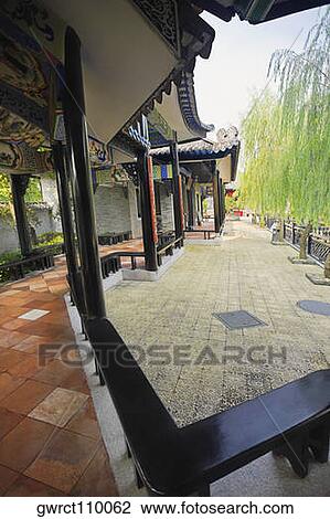 Walkway in a garden, Yu Yin Shan Fang, Panyu, Guangzhou, Guangdong Province, China View Large Photo Image Stock Image - Walkway in a garden, Yu Yin Shan Fang, Panyu, Guangzhou, Guangdong Province, China. Fotosearch