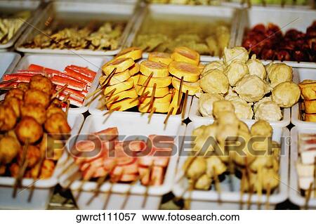 Assorted food on skewers at market stall, Nanjing, Jiangsu Province, China View Large Photo Image Stock Photo - Assorted food on skewers at market stall, Nanjing, Jiangsu Province, China. Fotosearch