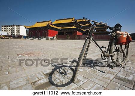Bicycle in front of a temple, Guan Yin Si, Hohhot, Inner Mongolia, China View Large Photo Image Stock Image - Bicycle in front of a temple, Guan Yin Si, Hohhot, Inner Mongolia, China. Fotosearch