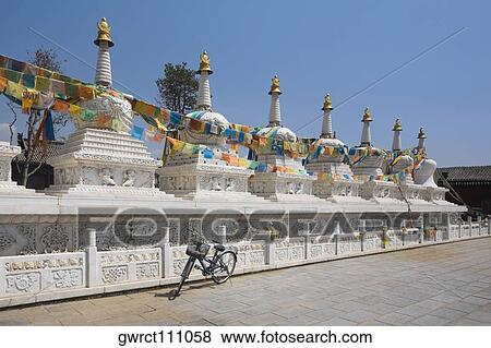 Stock Photo - Bicycle in front of a temple, Hohhot, Inner Mongolia, China. Fotosearch