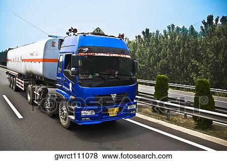 Fuel tanker moving on the road, Shandong Province, China View Large Photo Image Stock Photo - Fuel tanker moving on the road, Shandong Province, China. Fotosearch