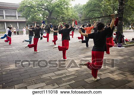 Group of people practicing with swords, Temple of Heaven, Beijing, China View Large Photo Image Stock Photo - Group of people practicing with swords, Temple of Heaven, Beijing, China. Fotosearch