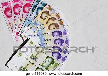 Stock Image - High angle view of Chinese Yuan notes. Fotosearch