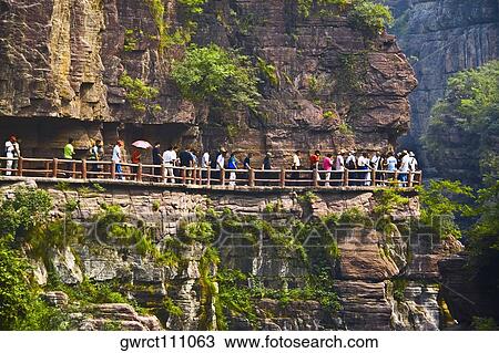 Tourists at an observation point, Mt Yuntai, Jiaozuo, Henan Province, China View Large Photo Image Stock Image - Tourists at an observation point, Mt Yuntai, Jiaozuo, Henan Province, China. Fotosearch