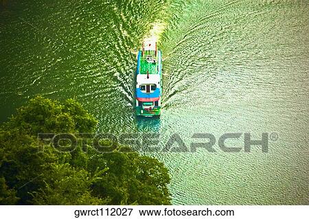 Aerial view of a boat in a river, Li River, XingPing, Yangshuo, Guangxi Province, China View Large Photo Image Stock Photo - Aerial view of a boat in a river, Li River, XingPing, Yangshuo, Guangxi Province, China. Fotosearch