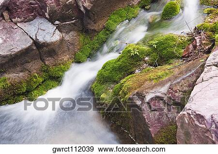 High angle view of a stream flowing through rocks, Mt Yuntai, Jiaozuo, Henan Province, China View Large Photo Image Stock Photo - High angle view of a stream flowing through rocks, Mt Yuntai, Jiaozuo, Henan Province, China. Fotosearch