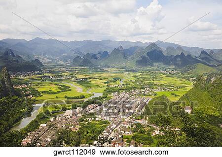 Stock Photo - High angle view of a town, Xingping, Yangshuo, Guangxi Province, China. Fotosearch