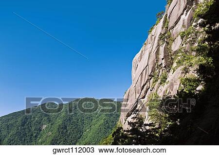 Low angle view of a mountain range, Huangshan, Anhui province, China View Large Photo Image Stock Image - Low angle view of a mountain range, Huangshan, Anhui province, China. Fotosearch