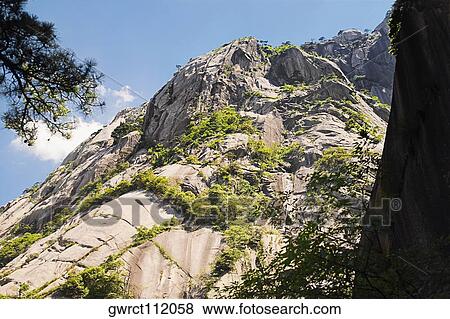 Low angle view of a mountain, Huangshan, Anhui province, China View Large Photo Image Stock Photo - Low angle view of a mountain, Huangshan, Anhui province, China. Fotosearch