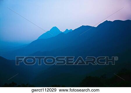 Stock Photo - Mountain covered with fog, Shaolin Monastery, Henan Province, China. Fotosearch