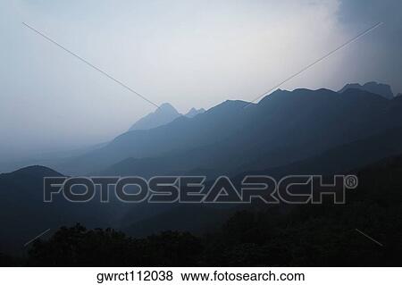 Mountain covered with fog, Shaolin Monastery, Henan Province, China View Large Photo Image Stock Photo - Mountain covered with fog, Shaolin Monastery, Henan Province, China. Fotosearch