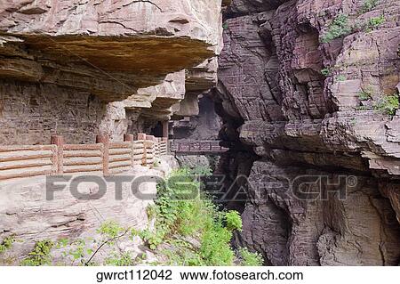 Stock Image - Railing along a rock formation, Mt Yuntai, Jiaozuo, Henan Province, China. Fotosearch