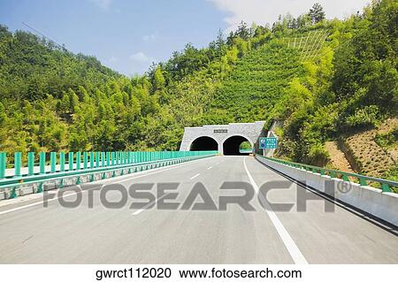 Road tunnel on a highway, Huangshan, Anhui province, China View Large Photo Image Stock Image - Road tunnel on a highway, Huangshan, Anhui province, China. Fotosearch