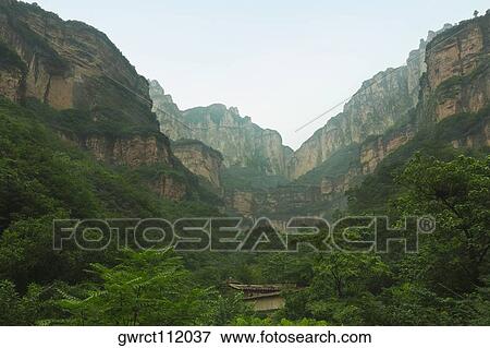 Trees in a canyon, Taihang Grand Canyon, Linzhou, Henan Province, China View Large Photo Image Stock Photo - Trees in a canyon, Taihang Grand Canyon, Linzhou, Henan Province, China. Fotosearch