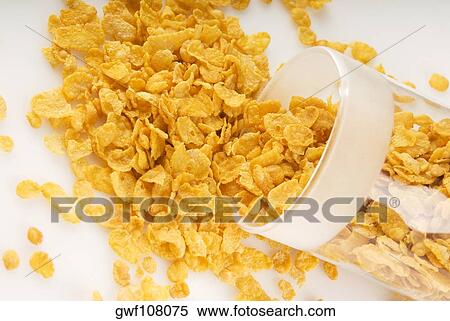 Close-up of a spilled jar of corn flakes View Large Photo Image Stock Photography - Close-up of a spilled jar of corn flakes. Fotosearch