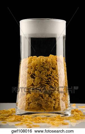 Close-up of corn flakes in a jar View Large Photo Image Stock Photograph - Close-up of corn flakes in a jar. Fotosearch