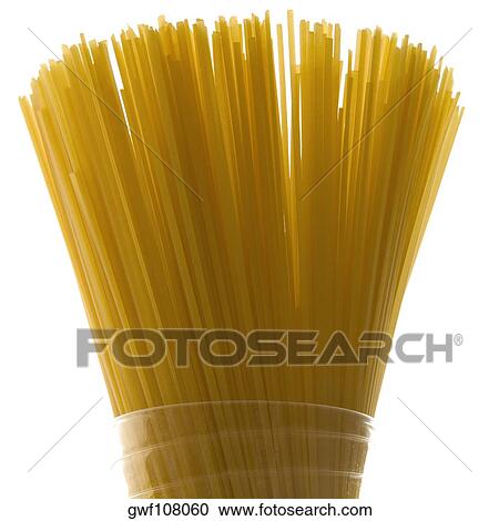 Close-up of raw spaghetti in a glass View Large Photo Image Stock Image - Close-up of raw spaghetti in a glass. Fotosearch