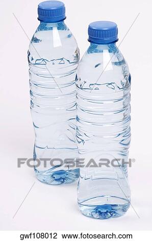 Stock Image - Close-up of two water bottles. Fotosearch