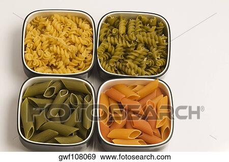 High angle view of raw pasta in bowls View Large Photo Image Stock Photo - High angle view of raw pasta in bowls. Fotosearch