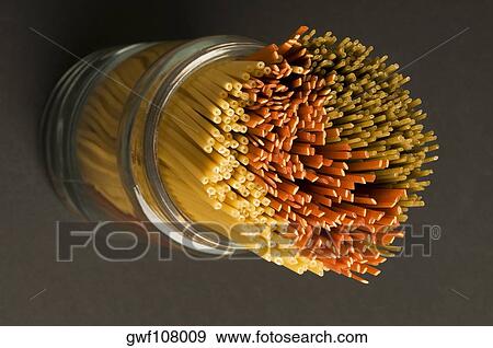 High angle view of spaghettis in a jar View Large Photo Image Stock Photo - High angle view of spaghettis in a jar. Fotosearch