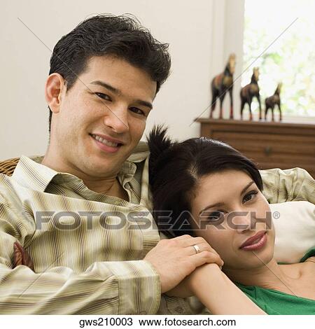 Portrait of a young couple smiling View Large Photo Image Stock Image - Portrait of a young couple smiling. Fotosearch