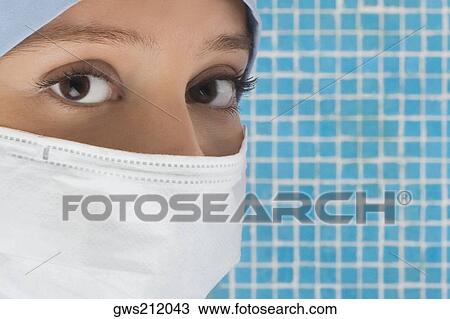 Stock Image - Close-up of a female surgeon. Fotosearch