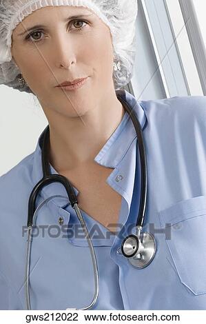Portrait of a female surgeon View Large Photo Image Stock Image - Portrait of a female surgeon. Fotosearch