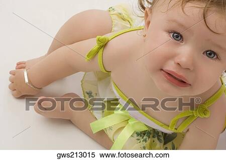 Stock Photography - Portrait of a girl crying. Fotosearch