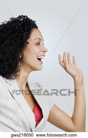 Close-up of a businesswoman laughing View Large Photo Image Stock Image - Close-up of a businesswoman laughing. Fotosearch