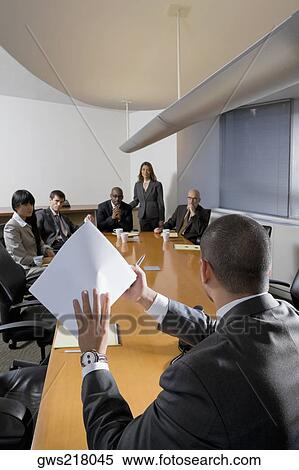 Business executives discussing in a meeting View Large Photo Image Stock Photography - Business executives discussing in a meeting. Fotosearch