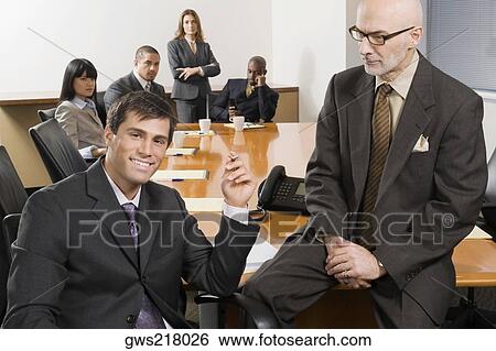 Business executives in a board room View Large Photo Image Stock Photograph - Business executives in a board room. Fotosearch