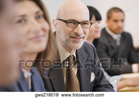 Stock Photo - Portrait of a businessman smiling. Fotosearch