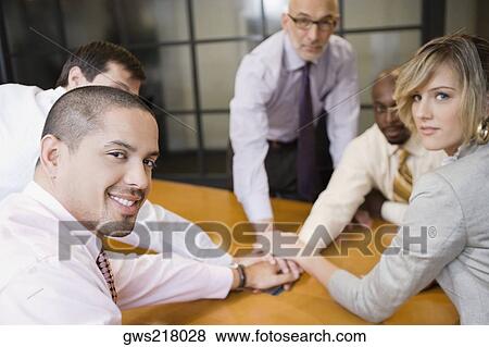 Portrait of business executives in an office View Large Photo Image Stock Photo - Portrait of business executives in an office. Fotosearch
