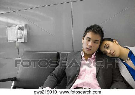 Businessman and a businessman sleeping in the waiting room View Large Photo Image Stock Image - Businessman and a businessman sleeping in the waiting room. Fotosearch